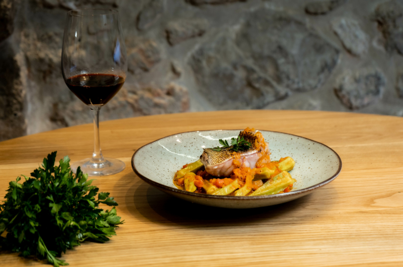 Dusky grouper with okras with a glass of Kotsifali P.G.I. Crete