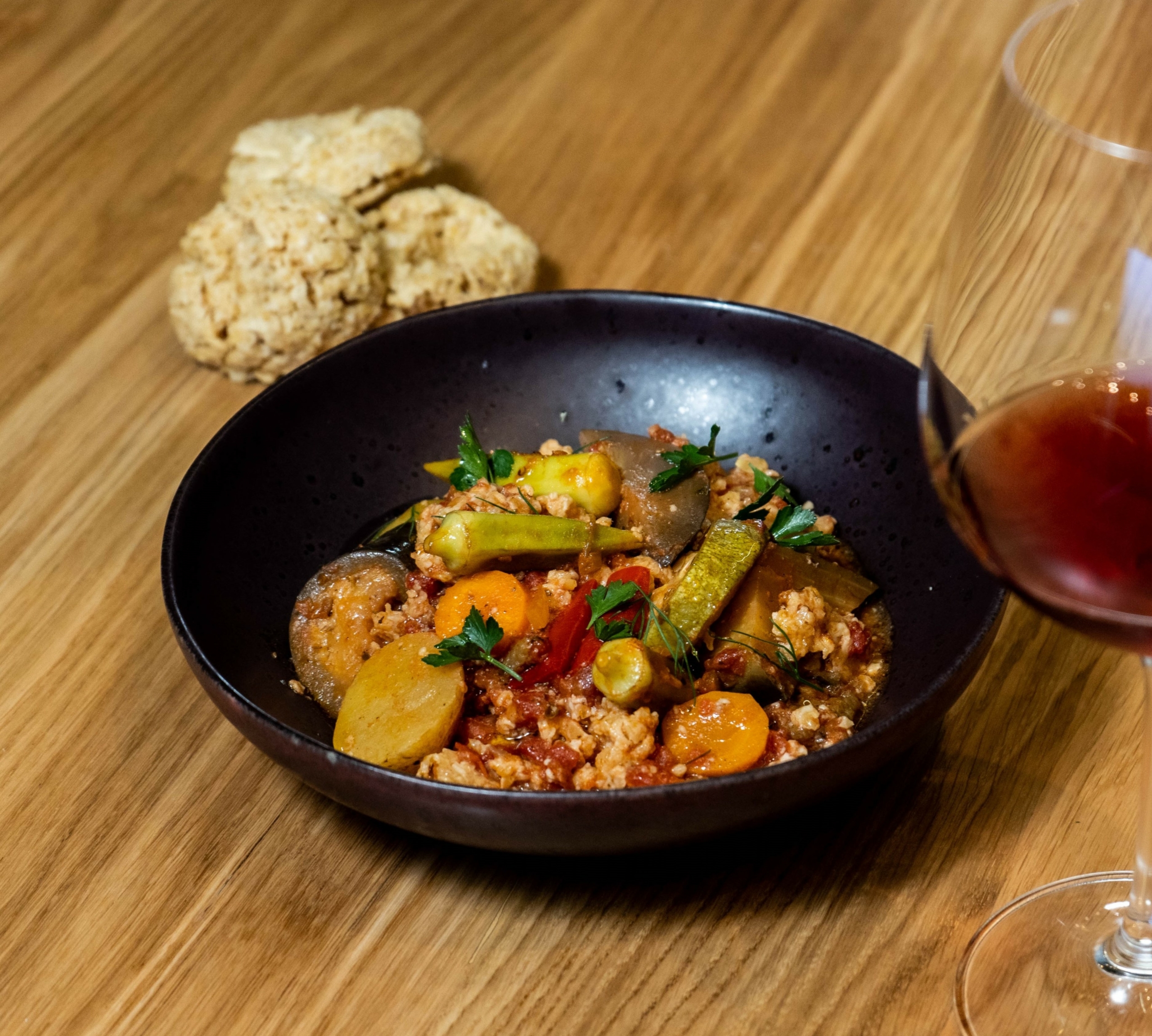 Sofegada with xinohondros(cracked cereals with fermented milk) with a glass of Liatiko P.G.I. Crete